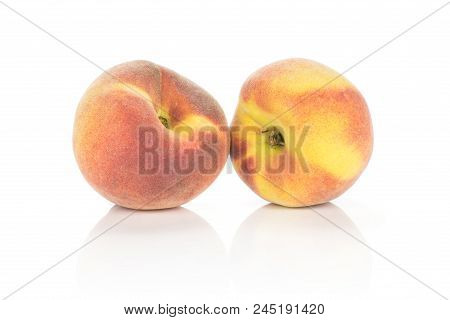 Pair Of Yellow Peaches With A Red Blush Isolated On White Background