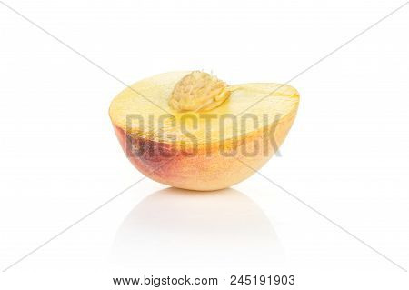 One Yellow Peach Half With A Drupe Isolated On White Background