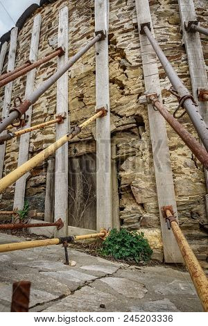 Bottom View Of Struts Holding Old Vintage Building Facade Structure