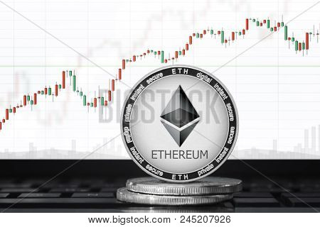 Ethereum (eth) Cryptocurrency; Ethereum Coin On The Background Of The Chart