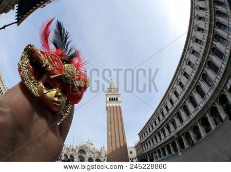 Venice Italy And A Mask In Saint Mark Square With Fish Eye Lens