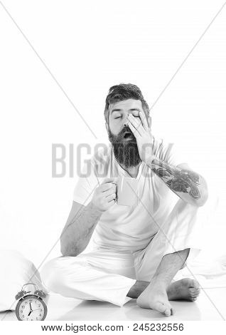 Sleepy Hipster Beard And Mustache Sit Near Alarm Clock. Man Needs To Get Up Early In Morning, White 