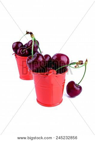 Ripe Red Cherry With Small Red Buckets Isolated On White Background