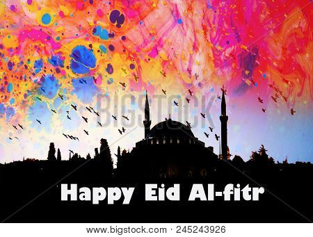 The Word Happy  Eid El Fitr Written Beside A Mosque