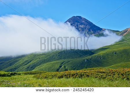 Kuril islads. Onecotan. Summer landscape with old vulkane.