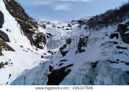 Great Waterfall In The Mountains Of Norway Called Kjosfossen