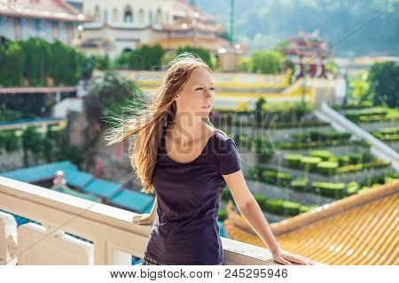Young Woman Tourist In Buddhist Temple Kek Lok Si In Penang, Malaysia, Georgetown.
