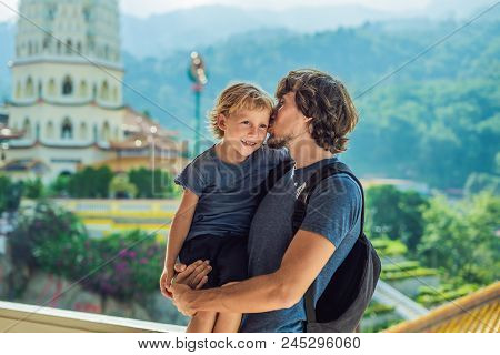 Father And Son Tourists In Buddhist Temple Kek Lok Si In Penang, Malaysia, Georgetown. Traveling Wit