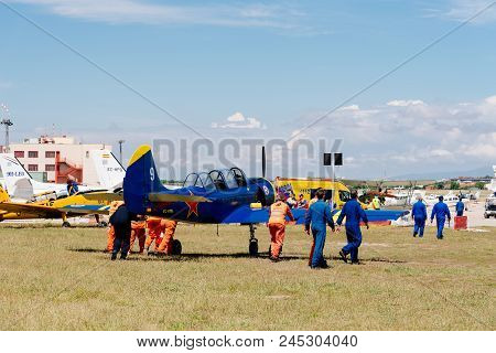Madrid, Spain - June 3, 2018:  Yak 52 Russian Aerobatic Aircraft During Air Show Of Historic Aircraf