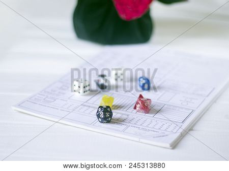 Role Playing Concept Plastic Dices On Character Sheet