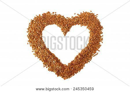 Sign  Heart Lined With Flax Seeds. Concept- Healthy Diet, Cancer Prevention, Vegetarianism, Raw Food