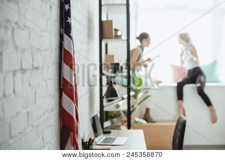 Closeup Shot Of United States Of America Flag And Two Women On Blurred Background
