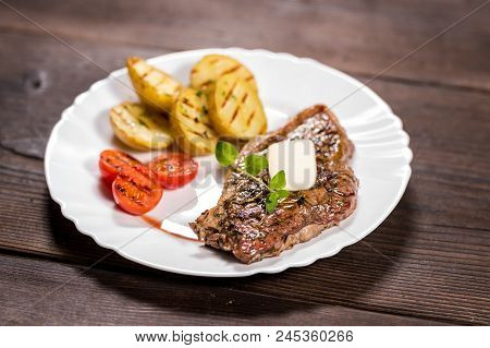 Beef Steak With Potatoes And Mini Tomatoes