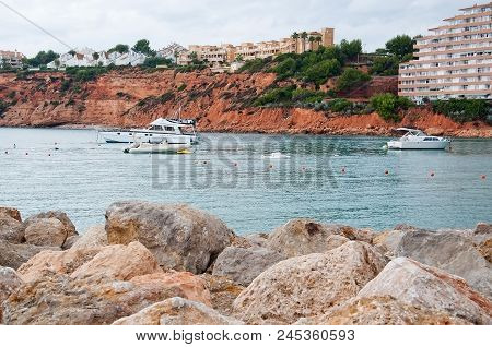 Residential Buildings On Red Sedimentary Rocks