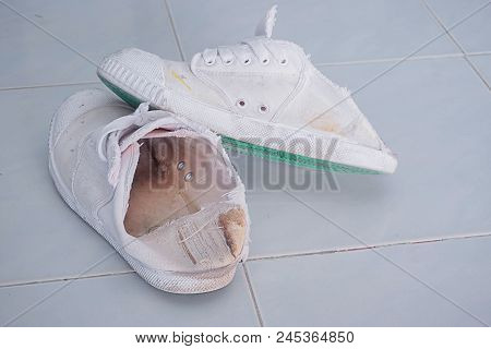 Old white shoes Used to play sepak takraw This is a Thai folk sport.
