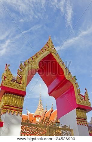 Pinnacle And Roof At Wat Chalong Temple Framed By A Door