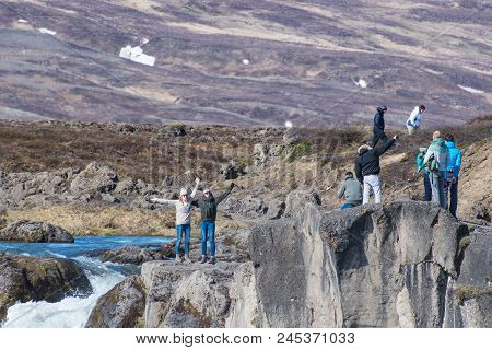 Godafoss Iceland - May 23. 2018: Tourists Having Fun While Taking Photos At Godafoss Waterfall In Ic