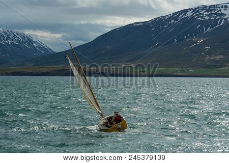 Hrisey Iceland - June 2. 2018: Sail Boat Sailing In Eyjafjordur On A Stormy Day