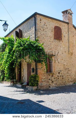 Arka Petrarka, Italy - June, 13, 2018: small street in an old town in Arka Petrarka, Italy