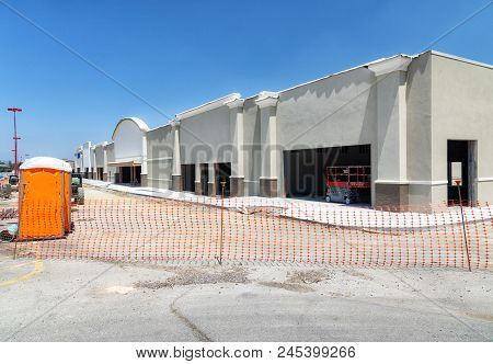 Horizontal Shot From The Corner Of A New Retail Construction Site In Tennessee.  It Is Fenced Off By