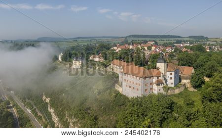 Three Castles Seen Over Cloud Sea In Dornburg, Thuringia, Germany