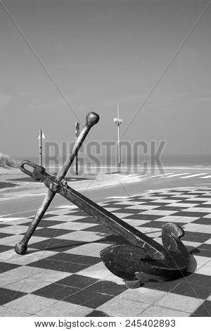 Black And White Image Of An Old Anchor Along The Dunkirk Coastline, France