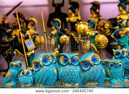 Athens, Greece - March 5, 2018 Greek Bronze Owls Symbol Athena Athens Greece.  Owls Are Symbol Of Gr