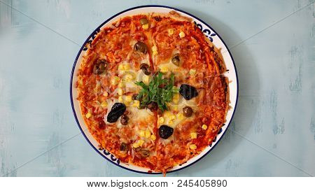 Deicious Pizza On The Table With Colorfull Background