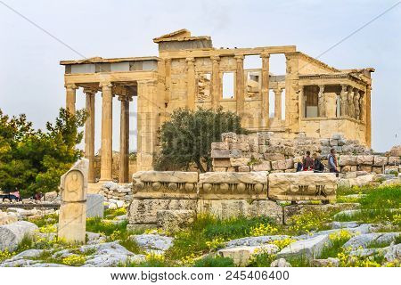 Athens, Greece - March 5, 2018 Ancient Monument Porch Caryatids Ruins Temple Of Erechtheion Acropoli