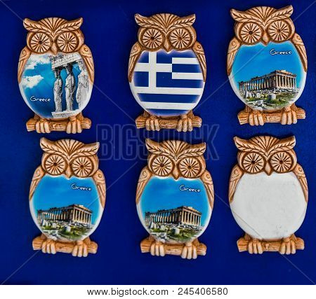 Athens, Greece - March 5, 2018 Greek Ceramic Designs Owl Magnets, Parthenon Athens Greece.  Owls Are