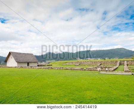 Ecuador May 2018 Reconstruction Of An Inca House And Ruins Of The Old Village. Archeologial Park Of 