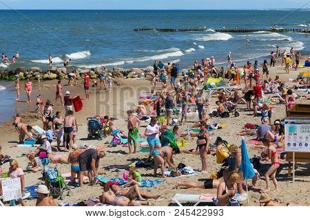 Zelenogradsk, Kaliningrad Region, Russia - July 29, 2017: Unknown People Resting On A Sandy Beach On