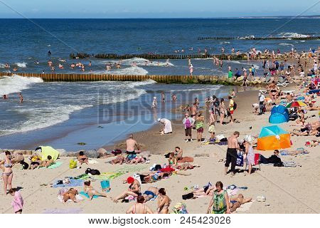 Zelenogradsk, Kaliningrad Region, Russia - July 29, 2017: Unknown People Resting On A Sandy Beach On