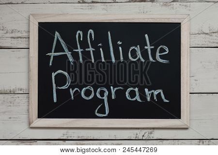 Affiliate Program Concept. Affiliate Marketing. Blackboard With Handwritten Text, Top View