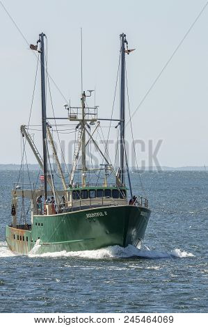 Fairhaven, Massachusetts, Usa - June 12, 2018: Crewmen Relaxing On Deck As Scalloper Bountiful Ii Re