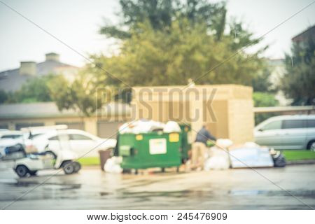 Vintage Blurred Worker Man Collecting Garbage