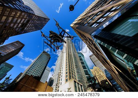 New York City - June 15, 2018: Drone Flying Over New York City Street Sign Of Fifth Ave And West 33r