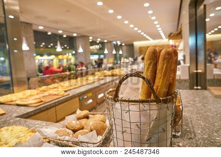 MILAN, ITALY - CIRCA NOVEMBER, 2017: bread on display at Farini in Milan. Farini is modern bakery which offers Italian pastry, salads, bowls and pizza