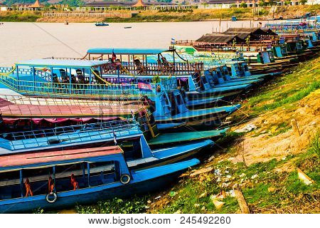 Many Boatsmen In Port Of Floating Village, Phnom Krom, Tonle Sap In Cambodia
