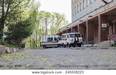 Postavy, Belarus - July 24, 2018: Two White Ambulances Near The Polyclinic Building