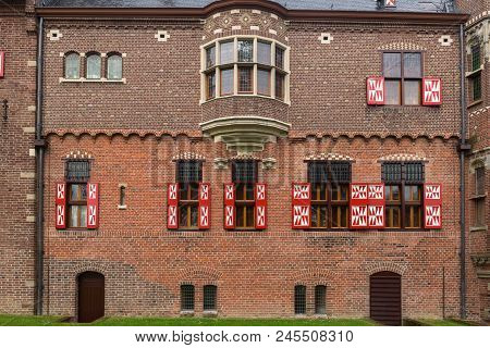 Red And White Decorations On The Doors And Window Shutters Of De Haar Castle. The Colors Are Derived
