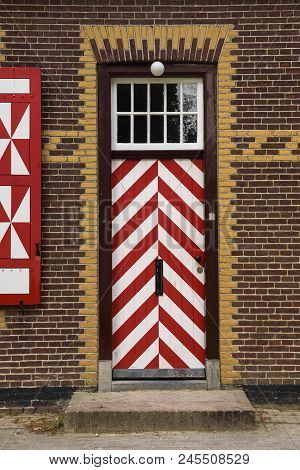 Red And White Decorations On The Doors And Window Shutters Of De Haar Castle. The Colors Are Derived