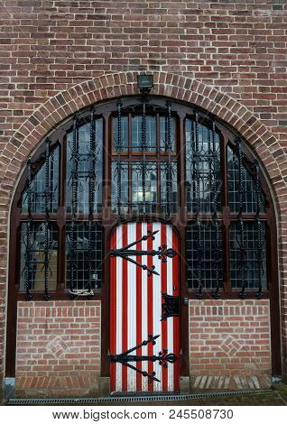 Red And White Decorations On The Doors And Window Shutters Of De Haar Castle. The Colors Are Derived