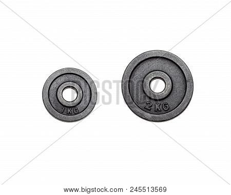 Black Metal Weights 1kg And 2kg On White Background With Clipping Path.