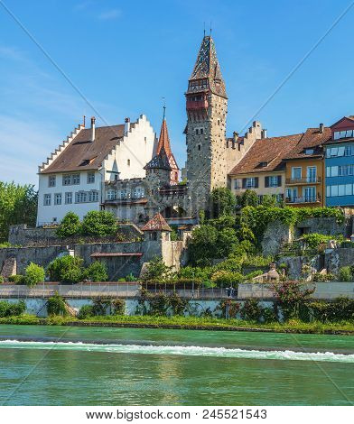 Bremgarten, Switzerland - June 16, 2018: buildings of the historic part of the town along the Reuss river. Bremgarten is a municipality in the Swiss canton of Aargau, its medieval old town is listed as a heritage site of national significance.