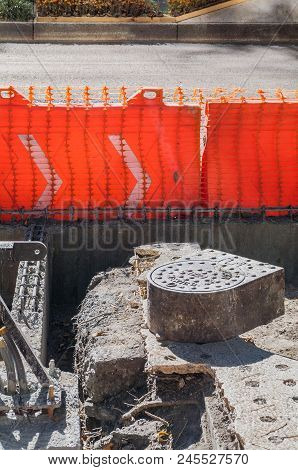 Take In Vertical Format Of A Sewer That Is Replaced On A Sidewalk Of Reforma Avenue During The Const