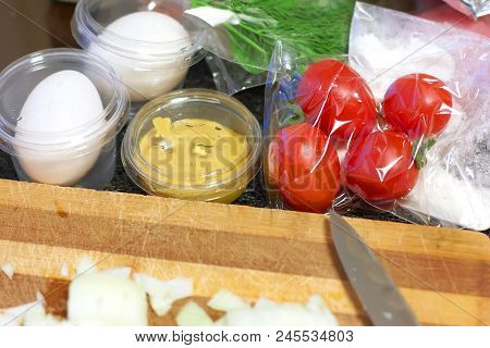 Fresh Products Prepacked For Salad. Tomatoes, Sour Cream, Arugula.