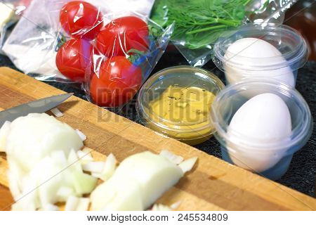 Fresh Products Prepacked For Salad. Tomatoes, Sour Cream, Arugula.