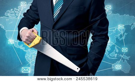 Businessman holding tool with global map graphic on the background
