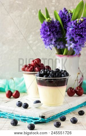 Italian Dessert Pana Cota With Berry Jam And Fresh Blueberries